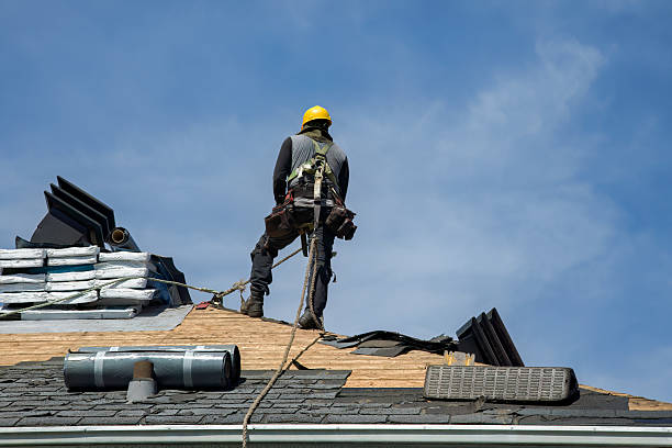 Professional Gutter Installation technician working in Conesville, IA